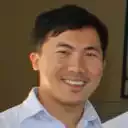 Potret testimonial pimpinan teknik John Doe untuk platform pengelasan presisi Descapro